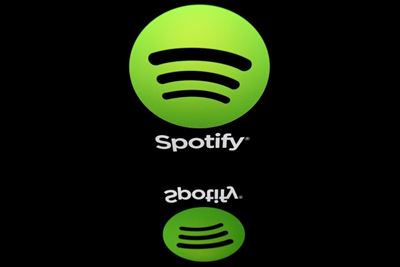 Spotify posts rare profit as paying users hit 158 million
