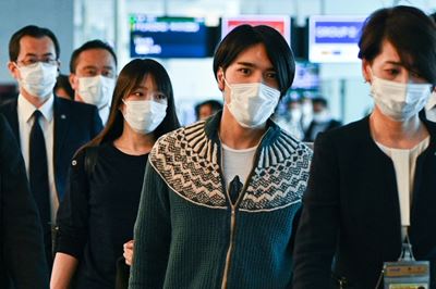 Japan's former princess Mako arrives in New York with husband