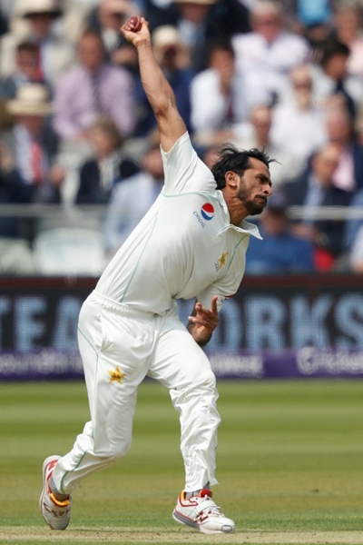 Hasan strikes for Pakistan as Cook holds firm in first Test