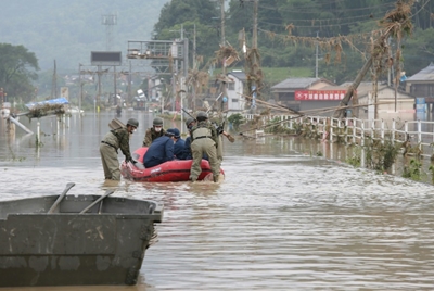 Desperate searches as dozens feared dead in Japan floods