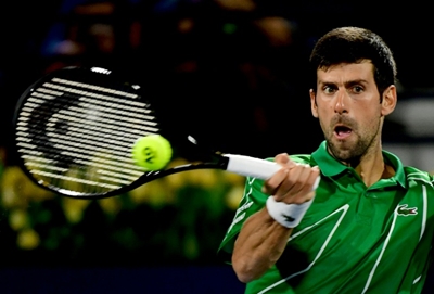 Djokovic pulls out of doubles in New York with neck pain