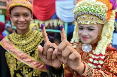 Indonesia votes as 'everyman' president battles firebrand ex-general