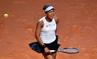 Osaka battles through pain to beat Cibulkova in Madrid, Kyrgios exits