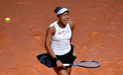 Osaka plays through pain, beats Cibulkova in Madrid