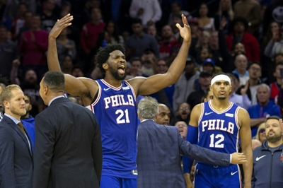 Sixers, Devils owners scrap pay cuts plan