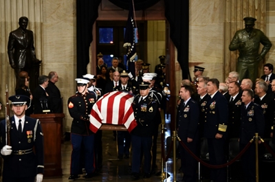 Late president Bush lies in state in Washington