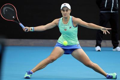 Top seed Barty battles into Australian Open quarter-finals