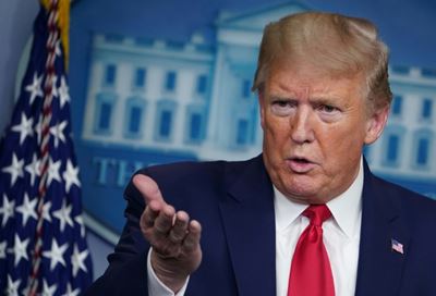 Trump says to ban immigration as US protestors demand lockdown end