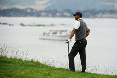 Woods 'fighting and hanging on' at US Open