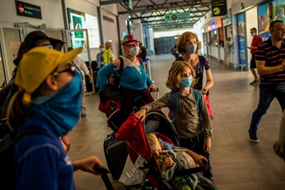 EU reopens to outside visitors as virus surges in US