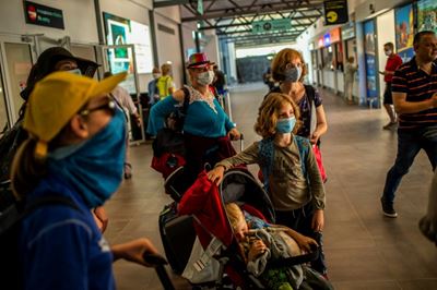 EU reopens to outside visitors as virus surges in US