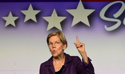 Warren edges ahead of Biden in latest US polls