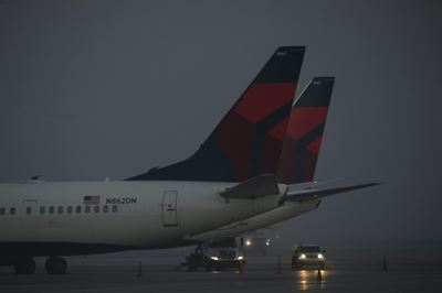 Delta Air Lines to levy $200 a month fee on unvaccinated workers 