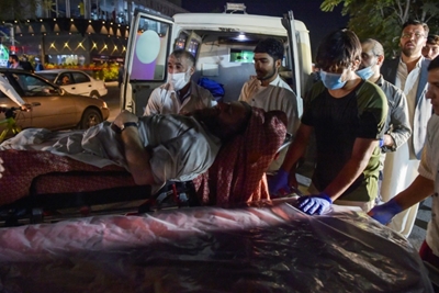 Islamic State suicide bombers kill scores at Kabul airport