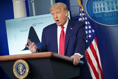 Trump doubles down on vaccine timeline, contradicts top expert
