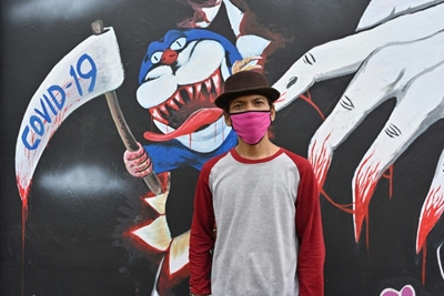 Scythes and monsters: Indonesian artists teach coronavirus care