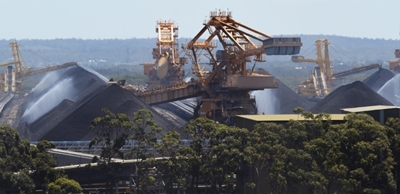 Australia vows to keep mining coal despite climate warning