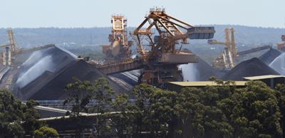 Australia vows to keep mining coal despite climate warning