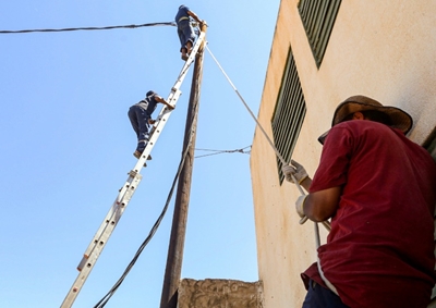 Residents await electricity in war-battered Tripoli
