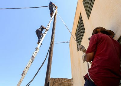 Residents await electricity in war-battered Tripoli