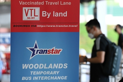Singapore, Malaysia ease Covid travel curbs