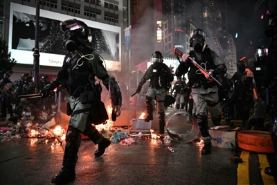 Hong Kong's summer of protests leaves economy bruised and battered