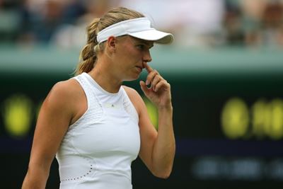 Second-ranked Wozniacki withdraws with right leg injury