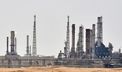 Saudi on track to partly restore oil output as market quakes