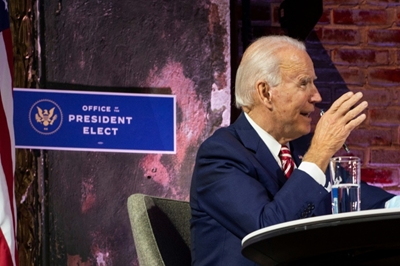 Biden warns 'more people may die' of virus if transition delayed
