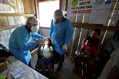 Amazon indigenous groups face choice: fight virus or flee
