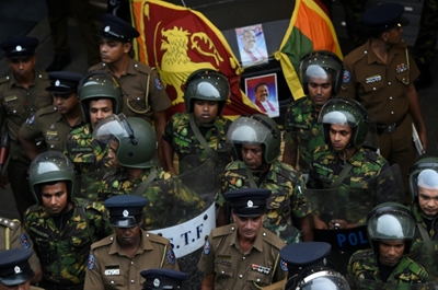 Pressure mounts on Sri Lankan president as crisis turns violent