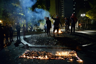Oregon police face off with far-left protesters