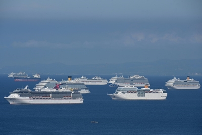 Stranded on ships, 200,000 seafarers struggle in virus limbo
