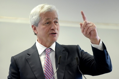 Hong Kong leader defends US bank head quarantine exemption
