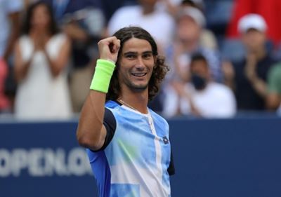 Malisse helps spark South African Lloyd to US Open last 8