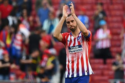 Tearful Godin confirms Atletico exit
