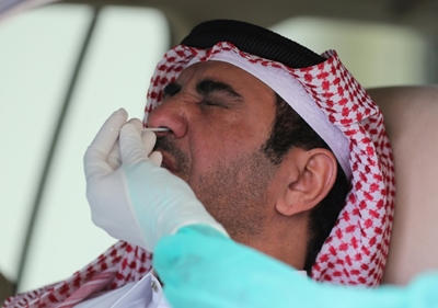 Record infections, few deaths: how Qatar has tackled COVID