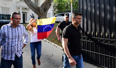 Caracas says Spain envoy helped Venezuela opposition leader flee