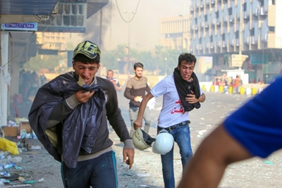 Three killed as Iraqis keep up protests amid fears of 'bloodbath'