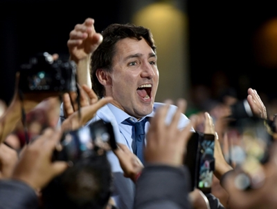 Canada vote too close to call as Trudeau hopes to cling on