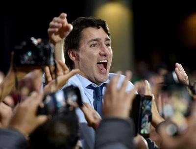 Canada vote too close to call as Trudeau hopes to cling on