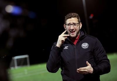 Football coach proves deafness is no hindrance to career on touchline