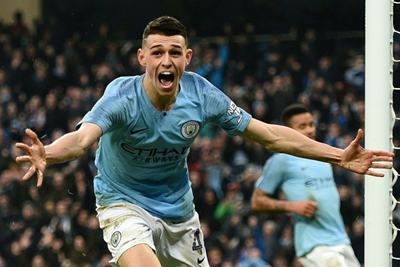 Foden pledges to stay and fight for Man City place