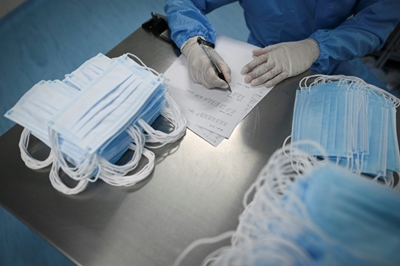 This season's must-have: medical gear modelled on Chinese runway
