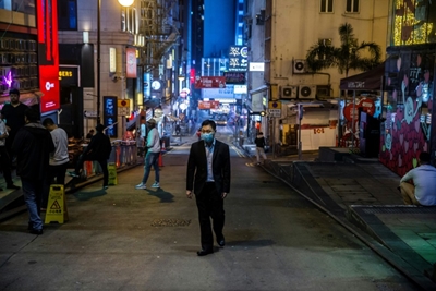 Hong Kong bars non-residents, limits alcohol over virus