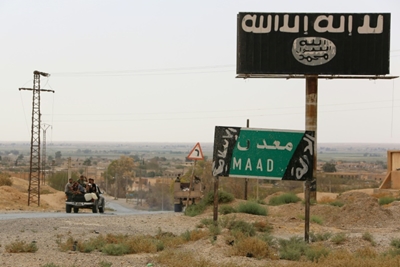 Many civilians among 54 dead in anti-IS strike in Syria