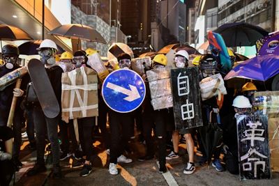 Hong Kongers harness traffic cones, kitchenware to battle tear gas