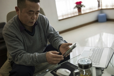 China's first 'cyber-dissident' faces trial