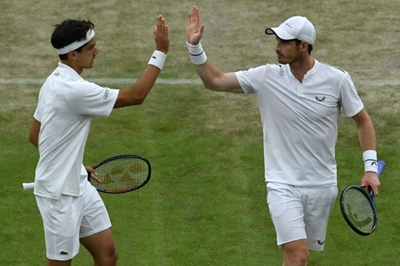 Fun is back for Murray on victorious Wimbledon return 