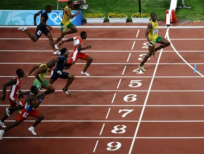Bolt goes viral with 'social distancing' Olympic photo